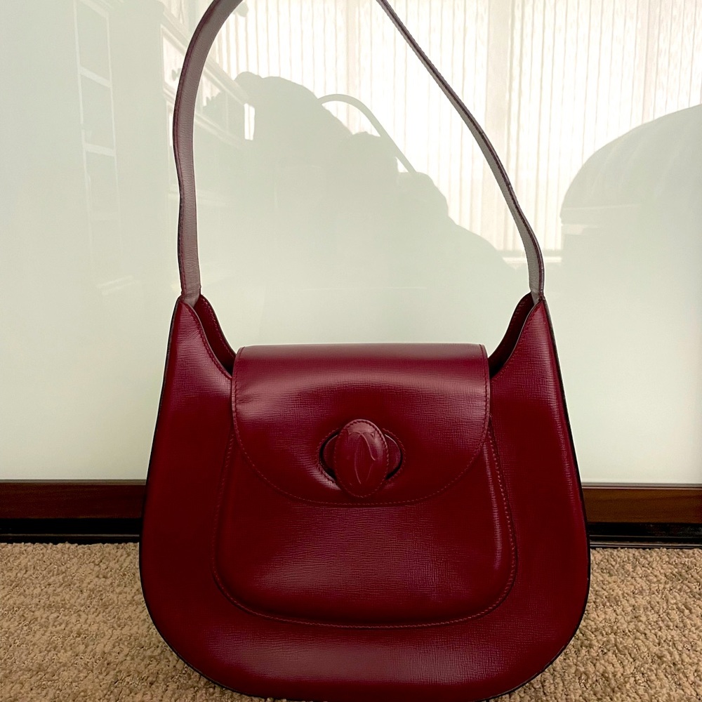 Authentic Cartier shoulder bag in burgundy